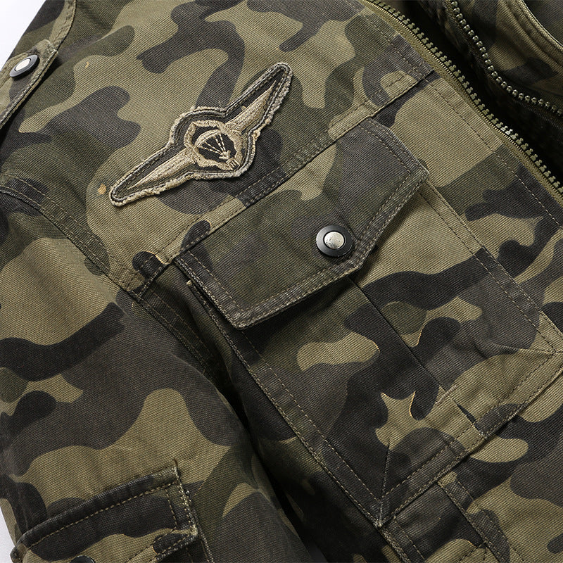 Chaqueta militar de camuflaje para hombre en lona resistente con hombreras, múltiples bolsillos y cuello alto