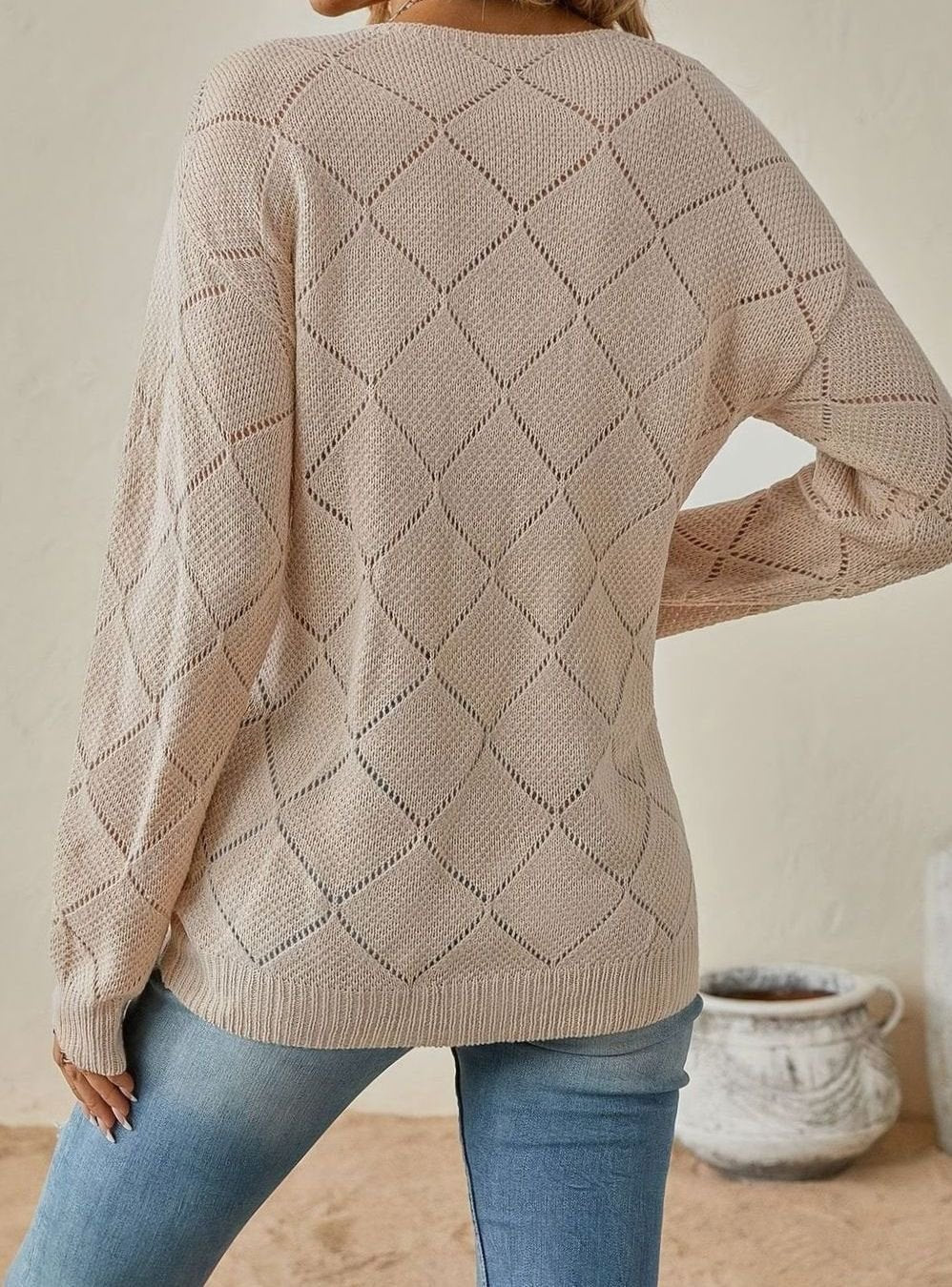 Jersey de punto calado con rombos y cuello en V de manga larga para mujer