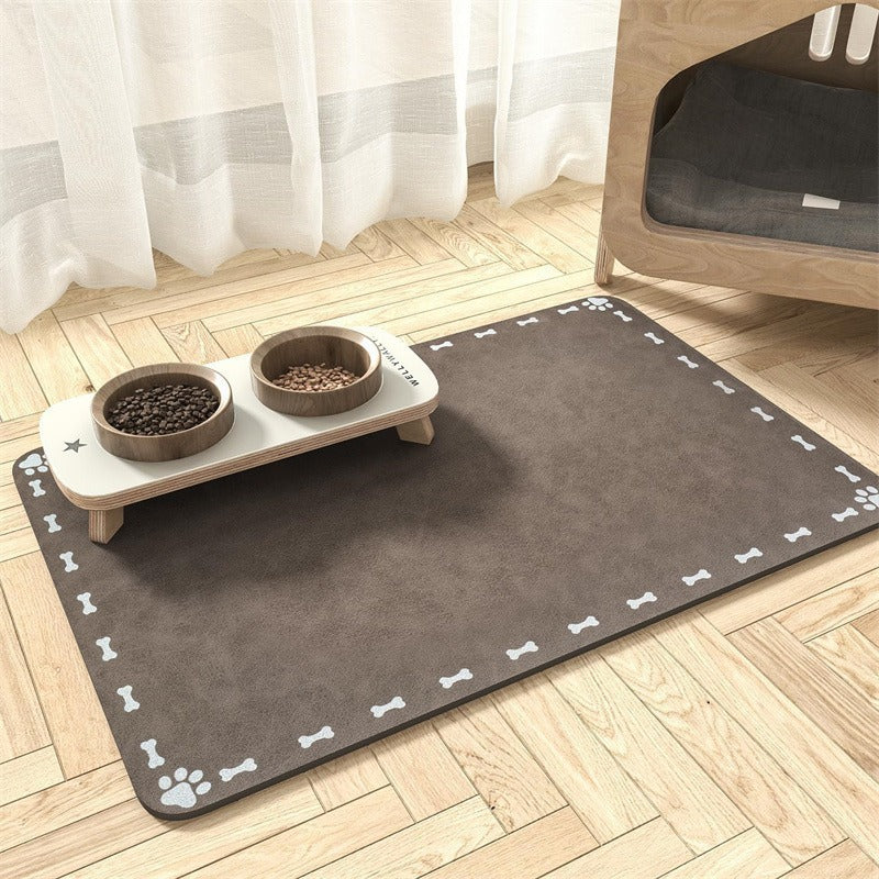 Alfombrilla para comederos de mascotas con base antideslizante