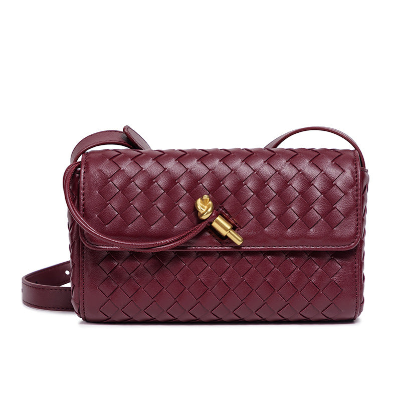 Bolso clutch bandolera trenzado