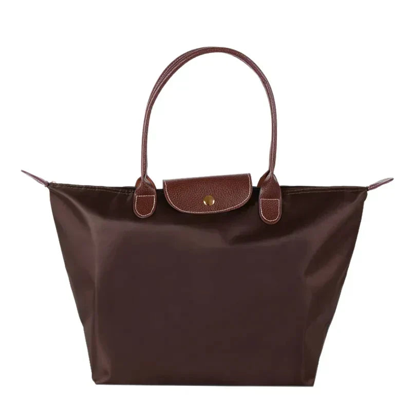 Bolso de Mano Clásico para Mujeres Celeste con Acento Moderno y Funcionalidad