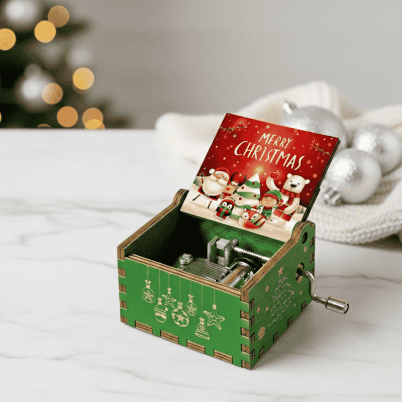 Caja de música navideña de manivela con melodía acogedora y motivo navideño tradicional
