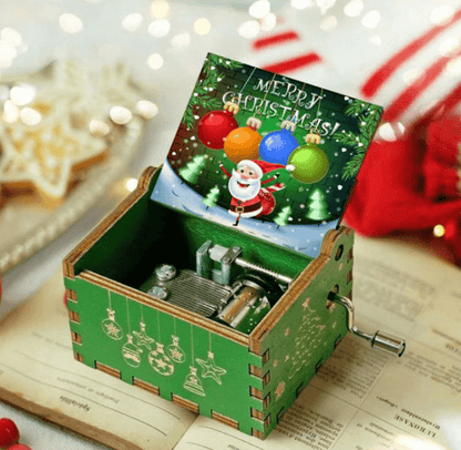 Caja de música navideña de manivela con melodía acogedora y motivo navideño tradicional