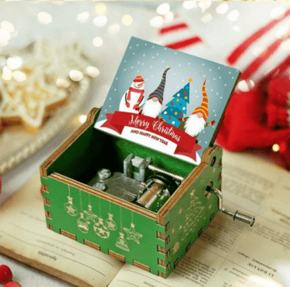 Caja de música navideña de manivela con melodía acogedora y motivo navideño tradicional