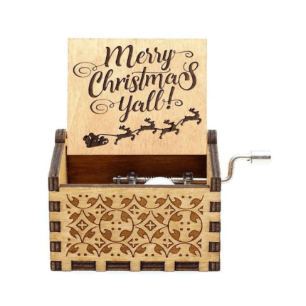 Caja de música navideña de manivela con melodía acogedora y motivo navideño tradicional