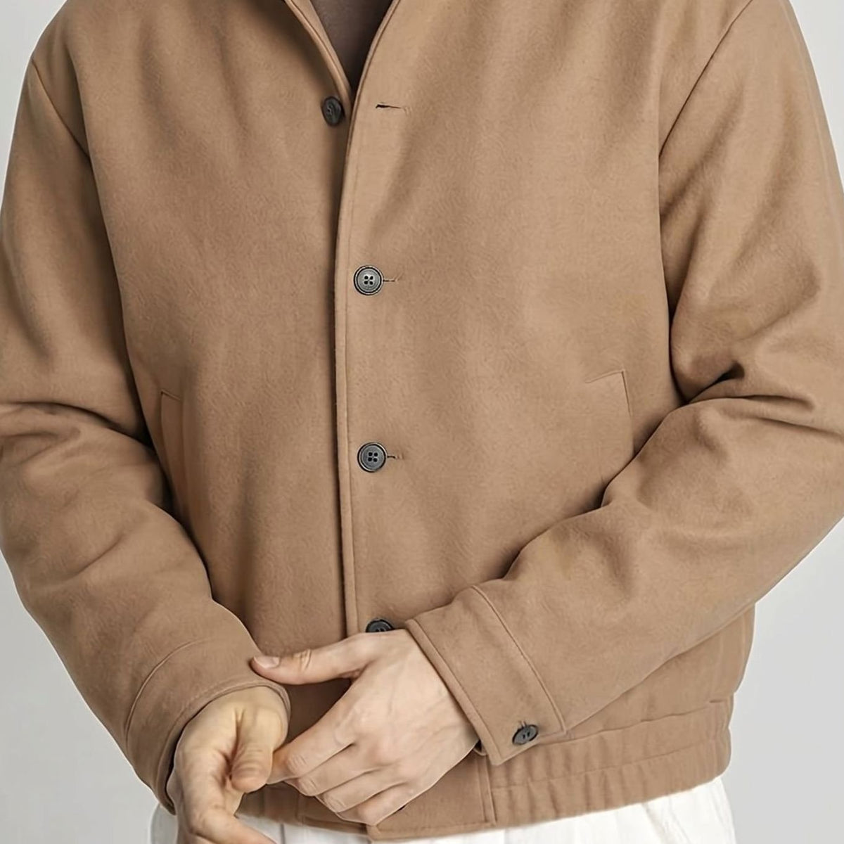 Cazadora bomber abotonada para hombre con efecto lana y cuello alto