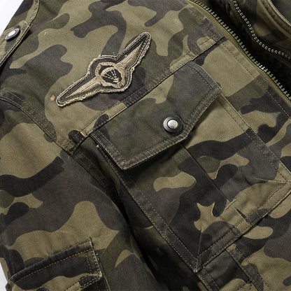 Chaqueta militar de camuflaje para hombre en lona resistente con hombreras, múltiples bolsillos y cuello alto