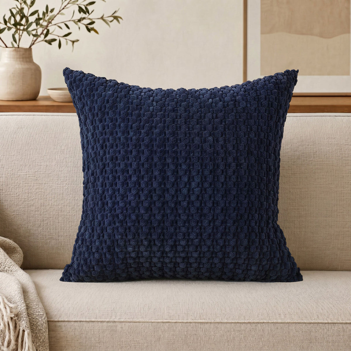 Cojín decorativo de chenilla texturizada con tejido de motas en relieve