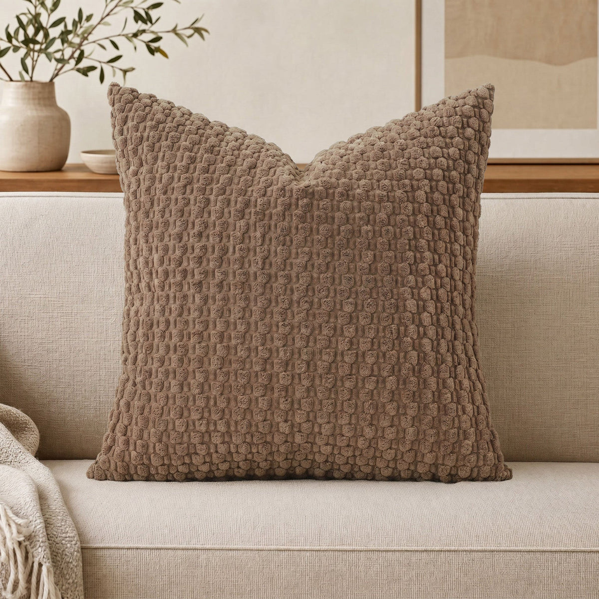 Cojín decorativo de chenilla texturizada con tejido de motas en relieve