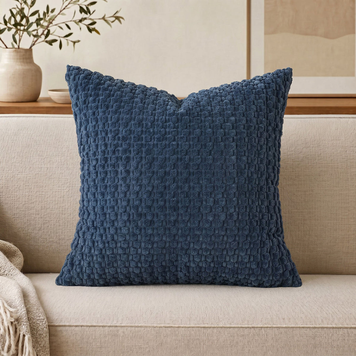 Cojín decorativo de chenilla texturizada con tejido de motas en relieve