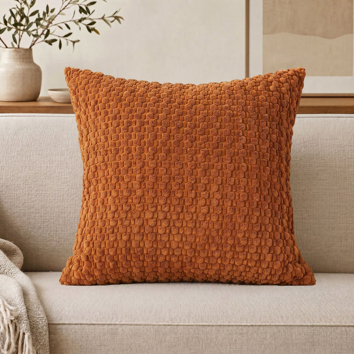 Cojín decorativo de chenilla texturizada con tejido de motas en relieve