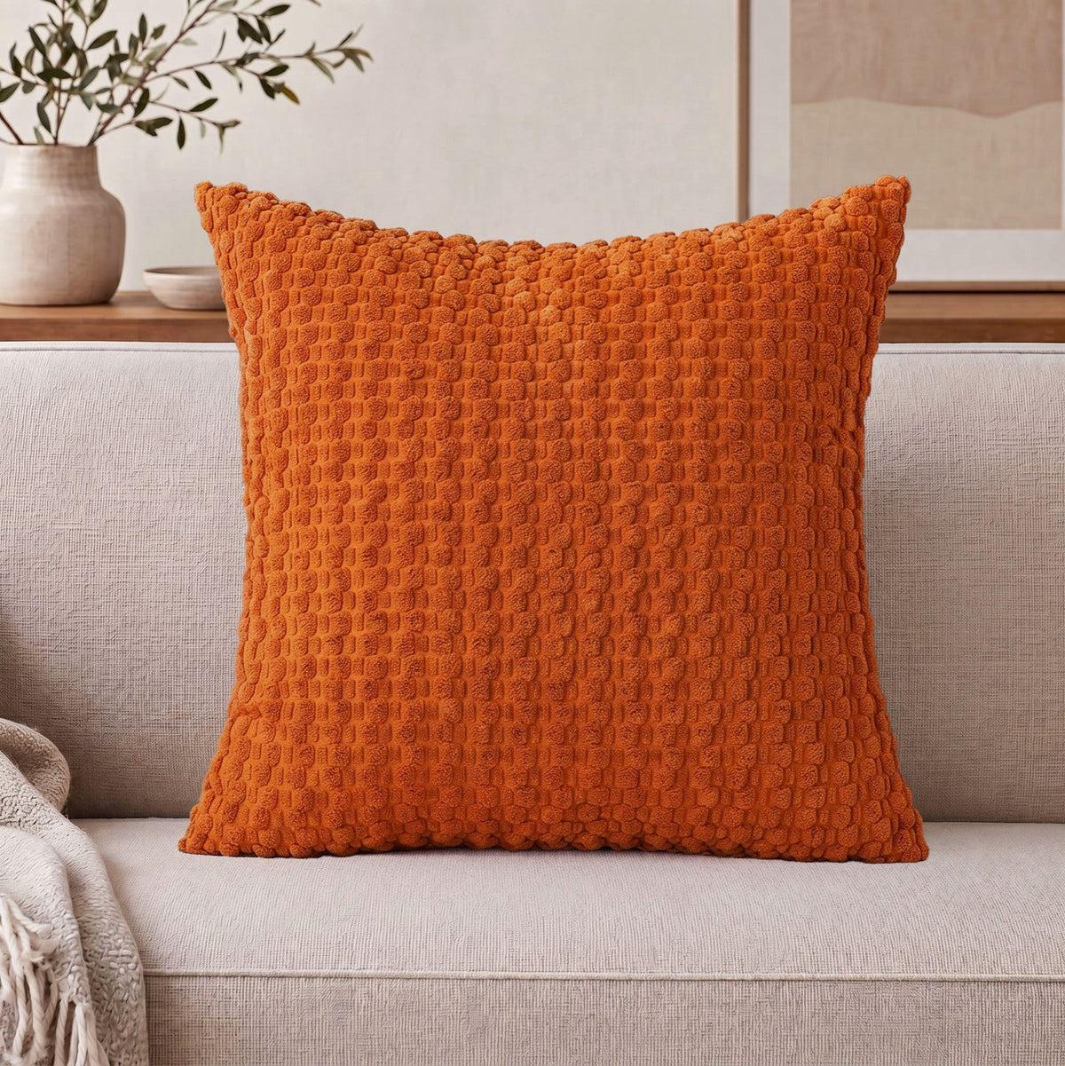Cojín decorativo de chenilla texturizada con tejido de motas en relieve