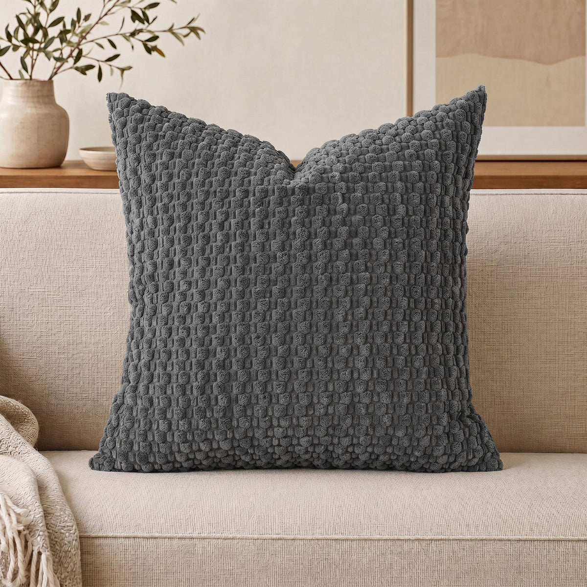Cojín decorativo de chenilla texturizada con tejido de motas en relieve