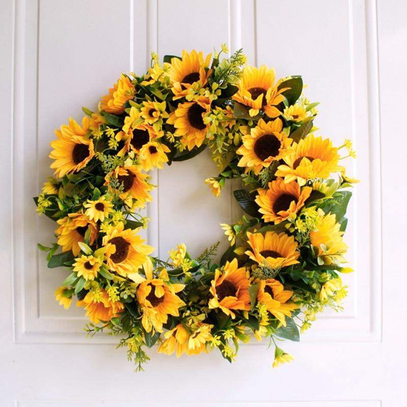 Corona artificial de girasoles dorados