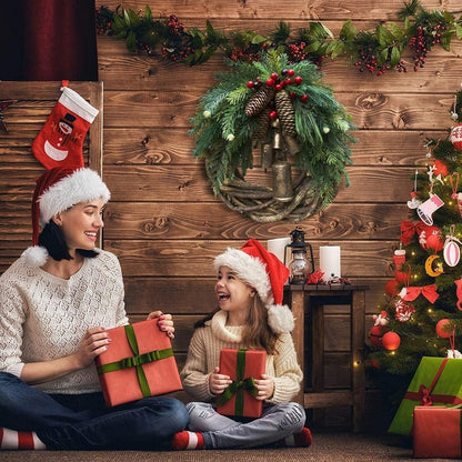 Corona de Navidad de estilo boho con base de ramas rústicas, piñas y campanas doradas