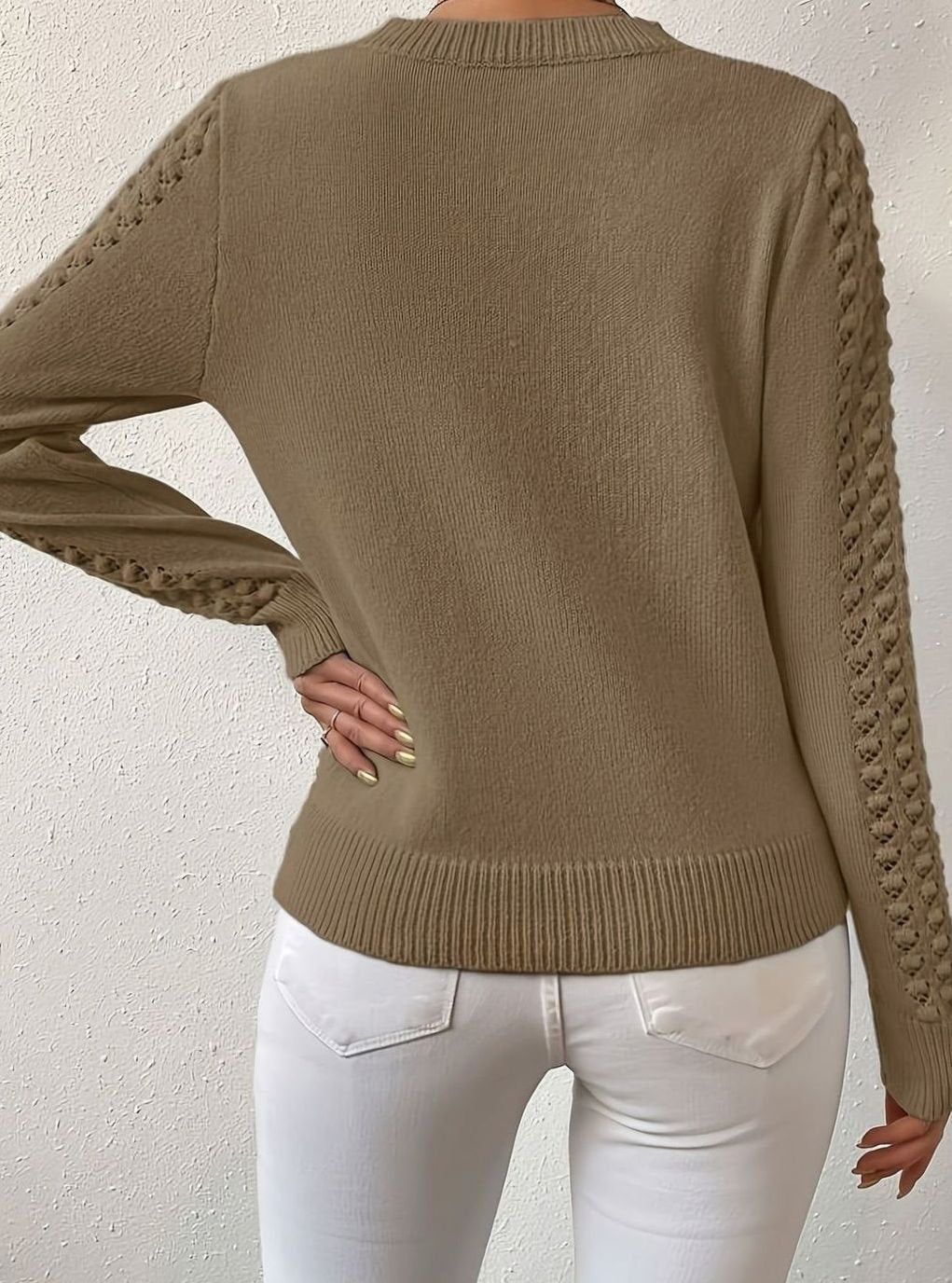 Jersey de punto calado con cuello redondo y manga larga para mujer