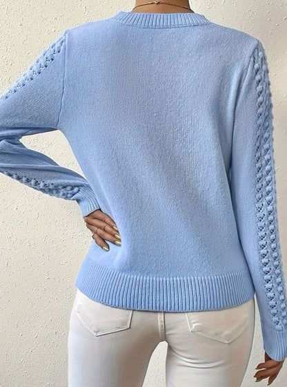 Jersey de punto calado con cuello redondo y manga larga para mujer
