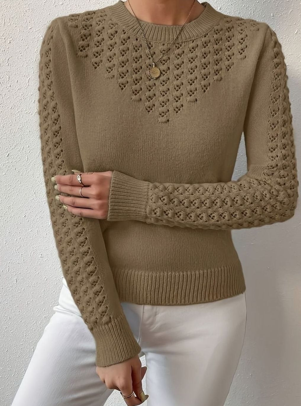 Jersey de punto calado con cuello redondo y manga larga para mujer