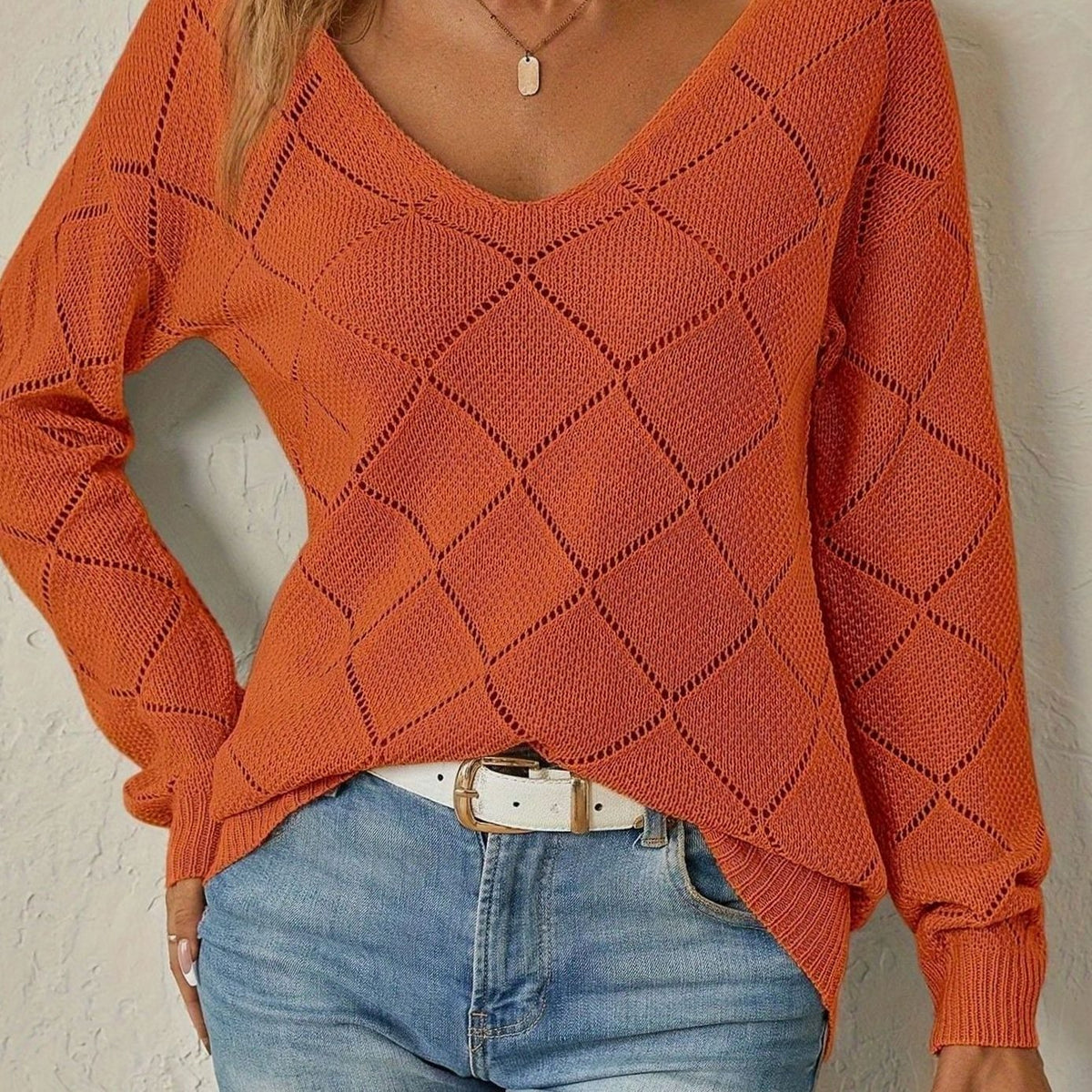 Jersey de punto calado con rombos y cuello en V de manga larga para mujer