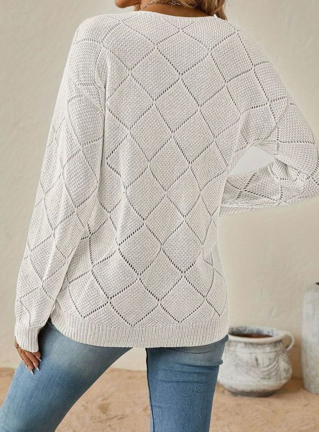 Jersey de punto calado con rombos y cuello en V de manga larga para mujer