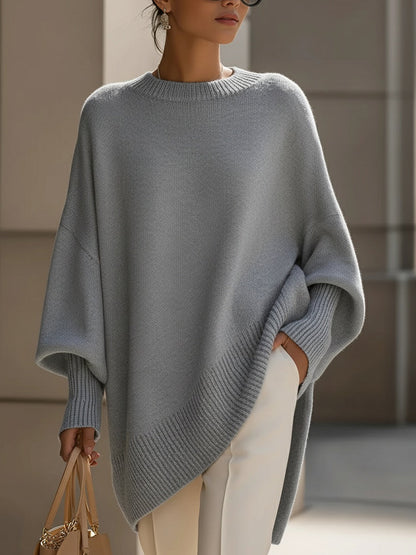 Jersey elegante con bajo asimétrico