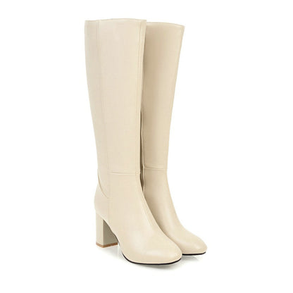 Lujosas botas de piel vegana con cremallera