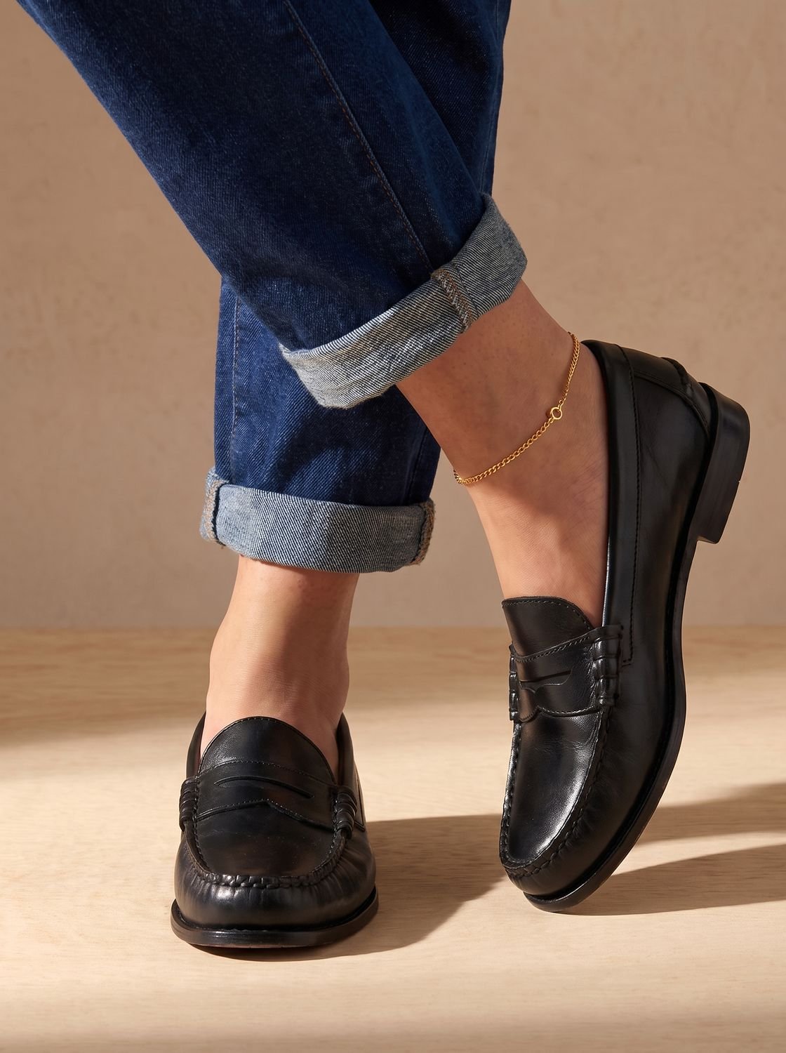 Mocasines penny de cuero para mujer con costuras de mocasín
