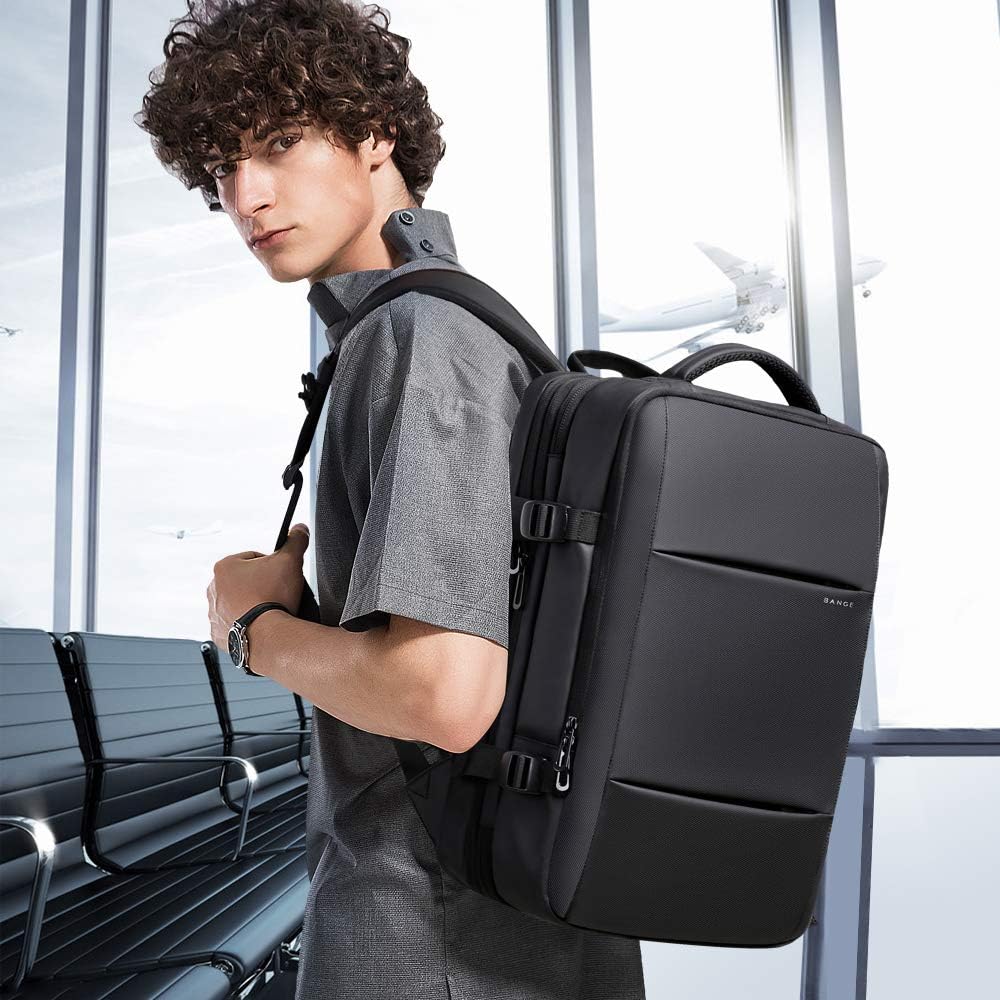 Mochila de viaje impermeable expandible de 26 a 45L con funda para laptop y asa de duffle