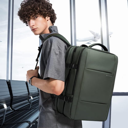 Mochila de viaje impermeable expandible de 26 a 45L con funda para laptop y asa de duffle