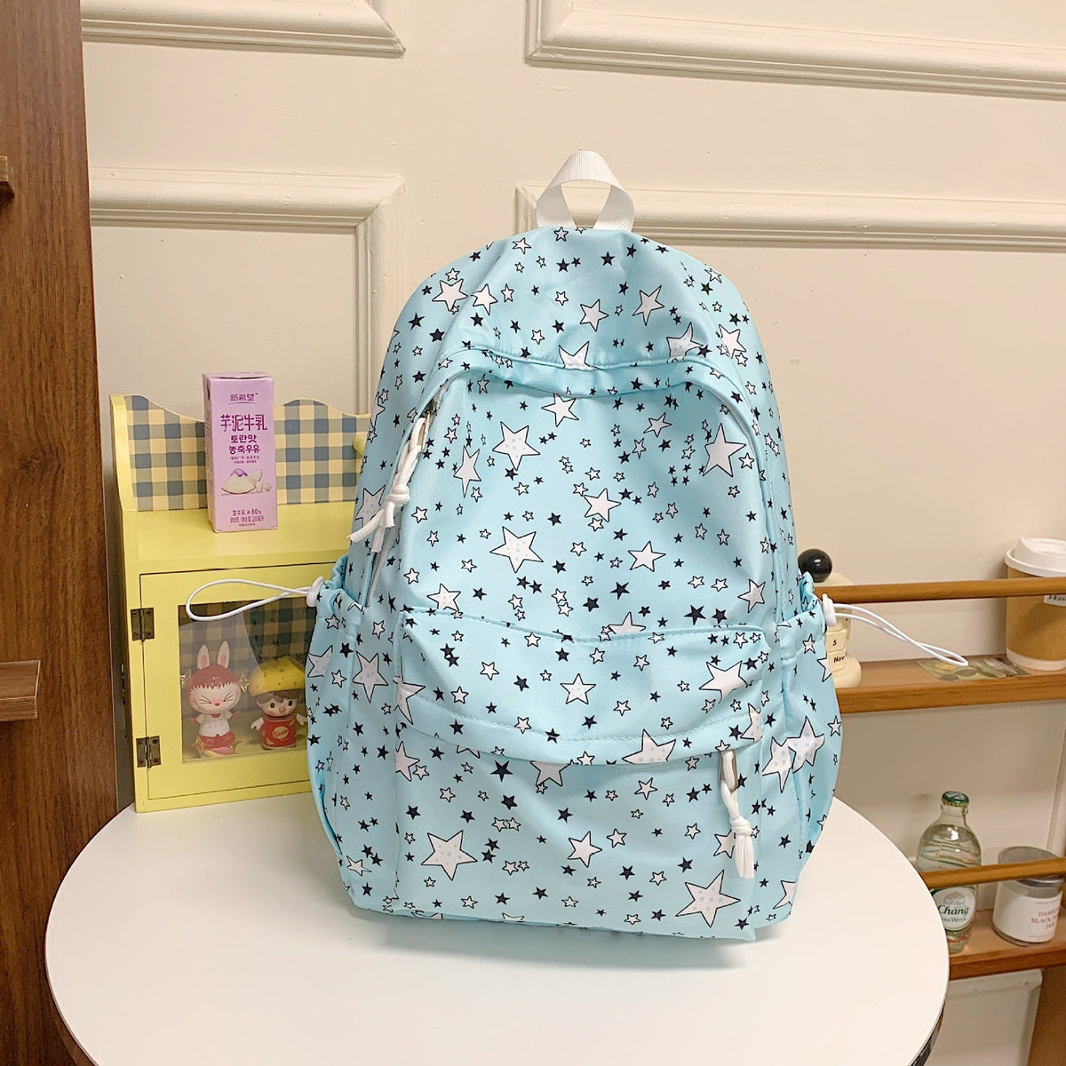 Mochila multibolsillos con estampado de estrellas