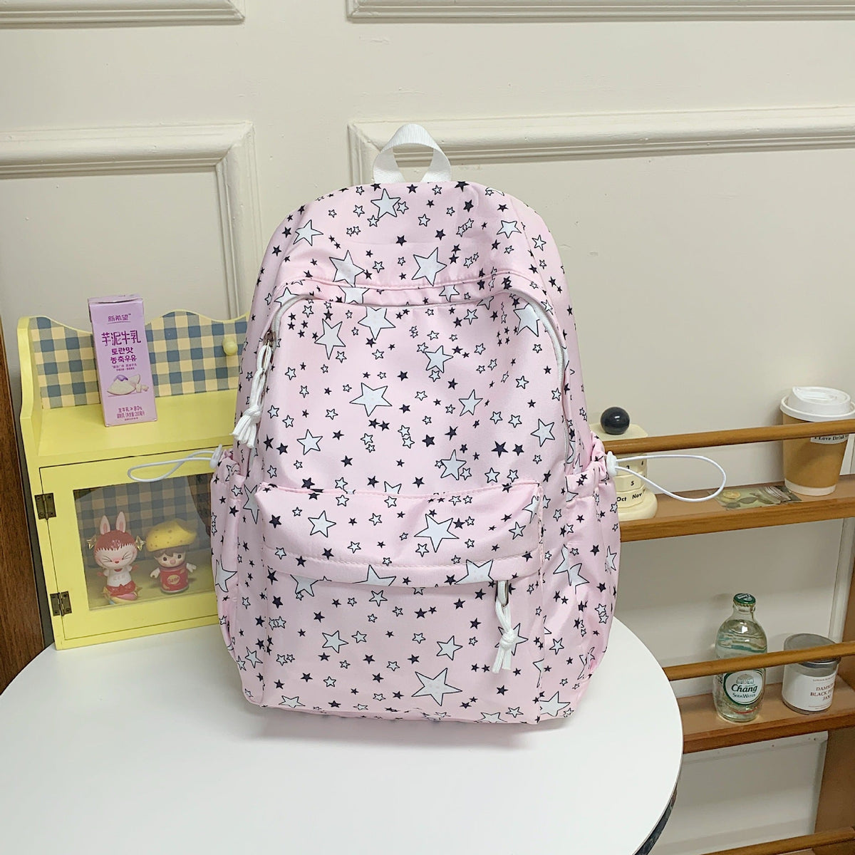 Mochila multibolsillos con estampado de estrellas