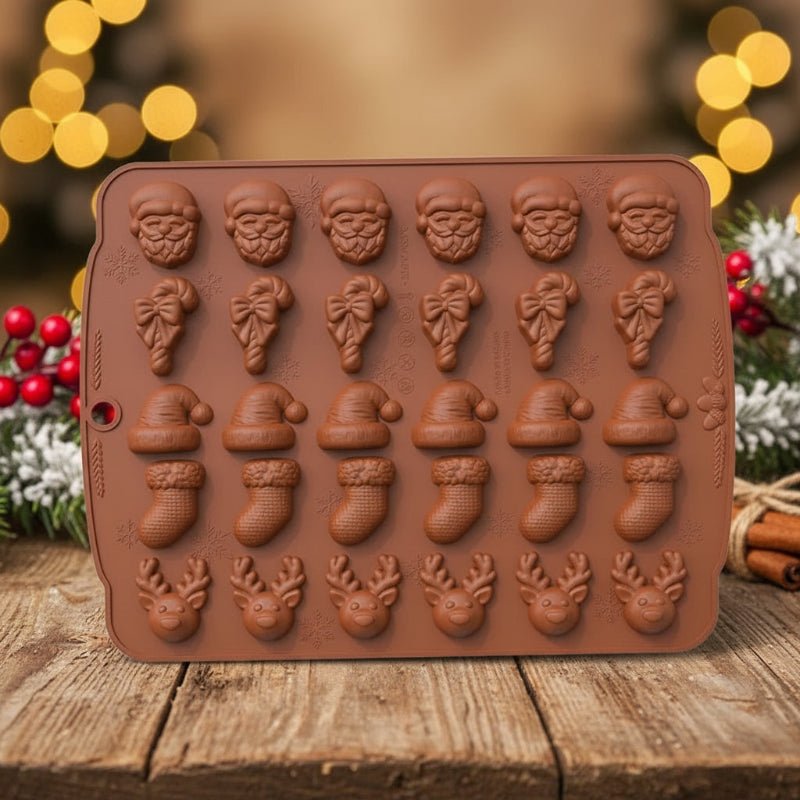Moldes antiadherentes navideños para galletas con formas de Papá Noel, muñeco de nieve y árbol
