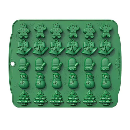 Moldes antiadherentes navideños para galletas con formas de Papá Noel, muñeco de nieve y árbol