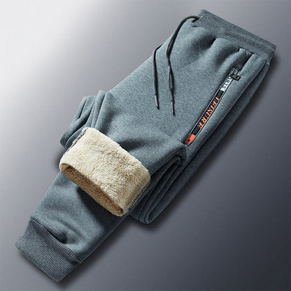 Pantalón de chándal térmico de invierno para hombre con forro polar, cintura elástica y bolsillos con cremallera