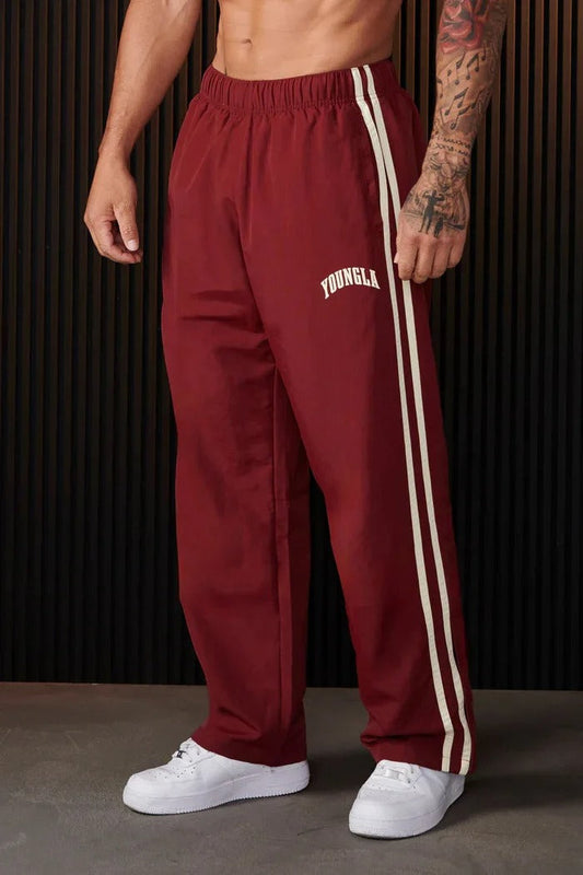 Pantalón deportivo para hombre con doble raya | Transpirable y flexible