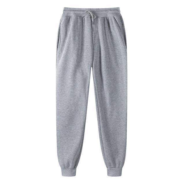 Pantalón jogger de tiro alto y corte holgado para mujer con cintura elástica, cordón ajustable y puños acanalados
