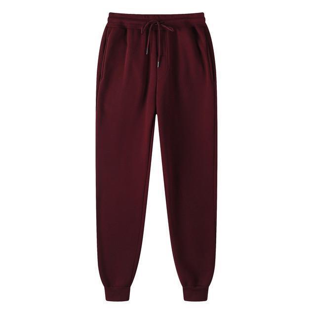 Pantalón jogger de tiro alto y corte holgado para mujer con cintura elástica, cordón ajustable y puños acanalados