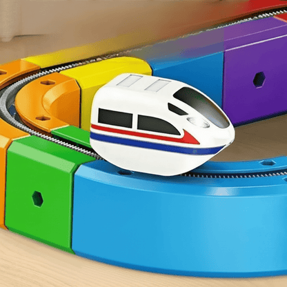 Set de construcción de circuito de tren 3D para niños con locomotora recargable