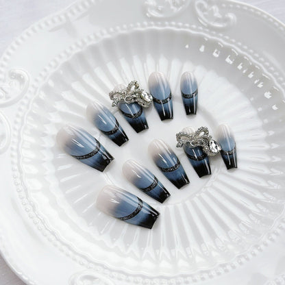 Set de uñas degradadas con pedrería decorativa
