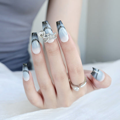 Set de uñas degradadas con pedrería decorativa