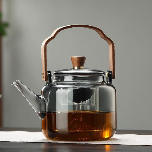 Tetera de Vidrio con Tapa de Madera y Filtro – 1.2 Litros, Vidrio Ahumado y Madera para una Elegante Experiencia de Té