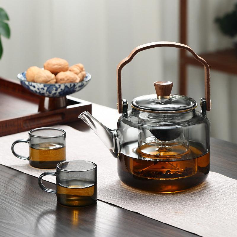 Tetera de Vidrio con Tapa de Madera y Filtro – 1.2 Litros, Vidrio Ahumado y Madera para una Elegante Experiencia de Té