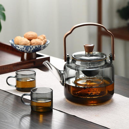 Tetera de Vidrio con Tapa de Madera y Filtro – 1.2 Litros, Vidrio Ahumado y Madera para una Elegante Experiencia de Té