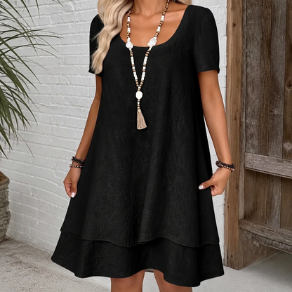 Vestido evasé de algodón y lino con doble bajo