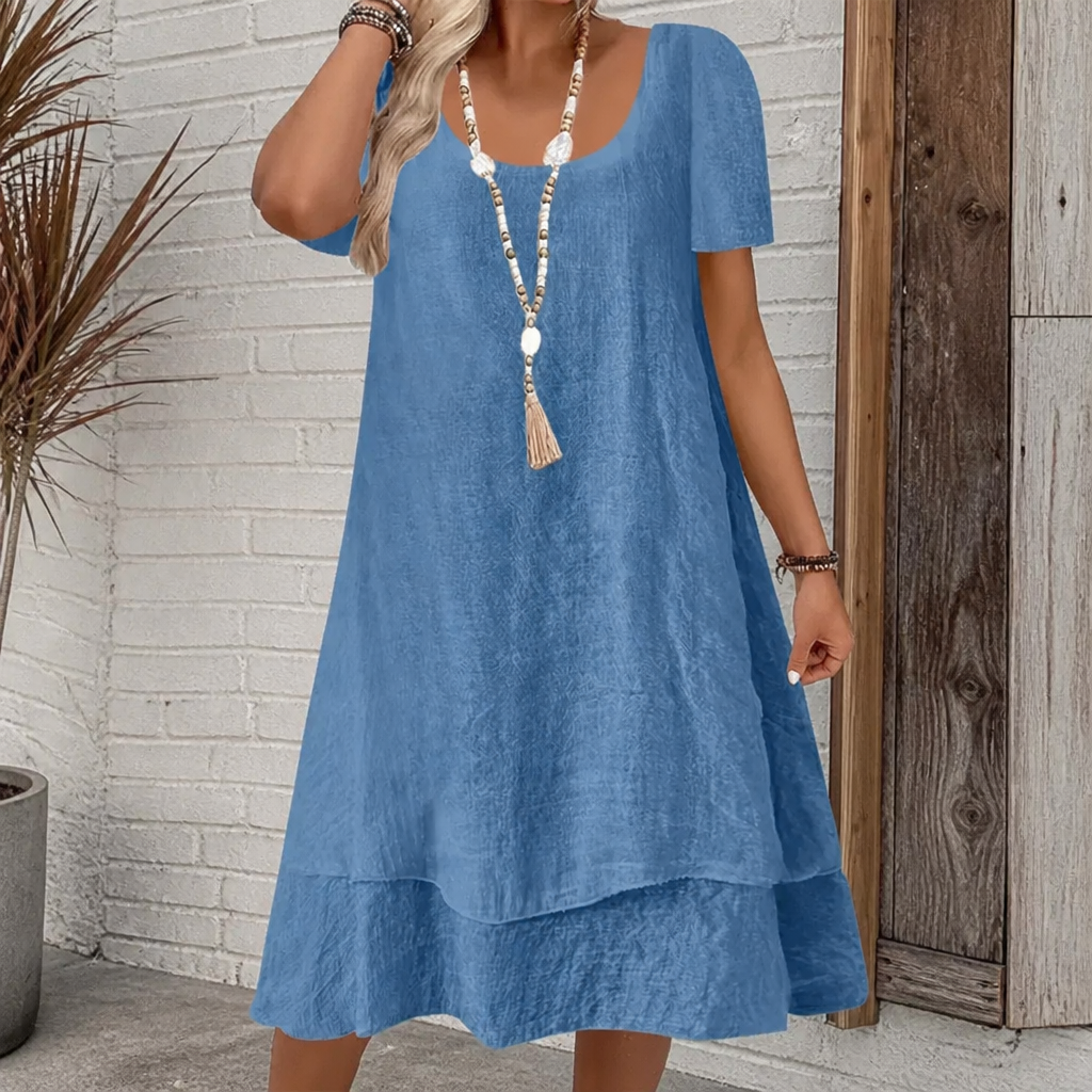 Vestido evasé de algodón y lino con doble bajo